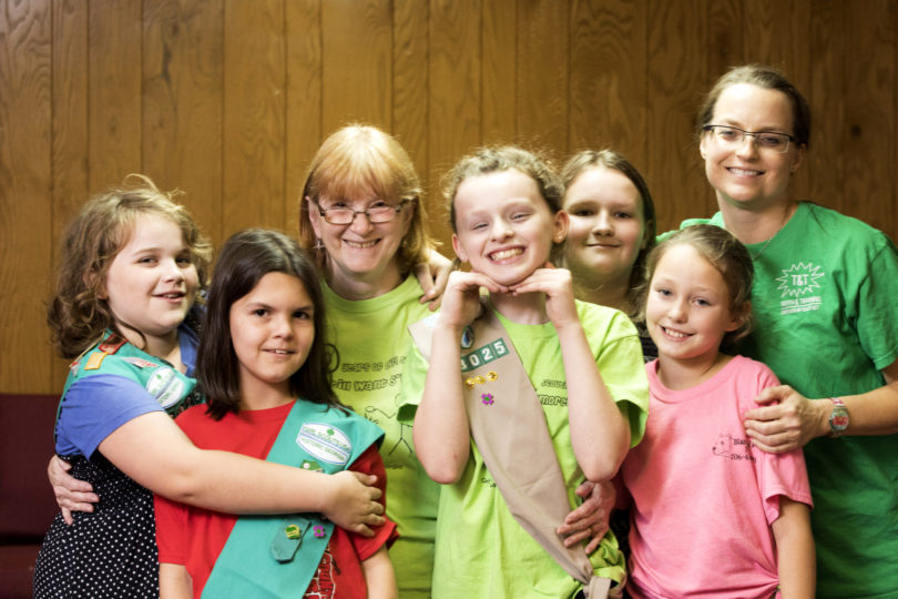 Barbara Galvond, shown third from left with her Girl Scout troop, has worked with girls in scouting at every age level.