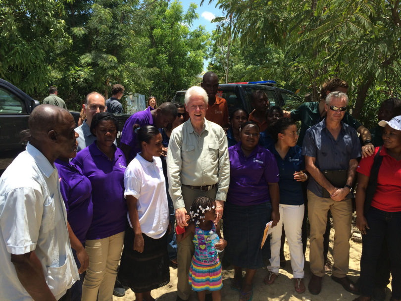 PMIL Bill Clinton with group Haiti 2014-h.photo