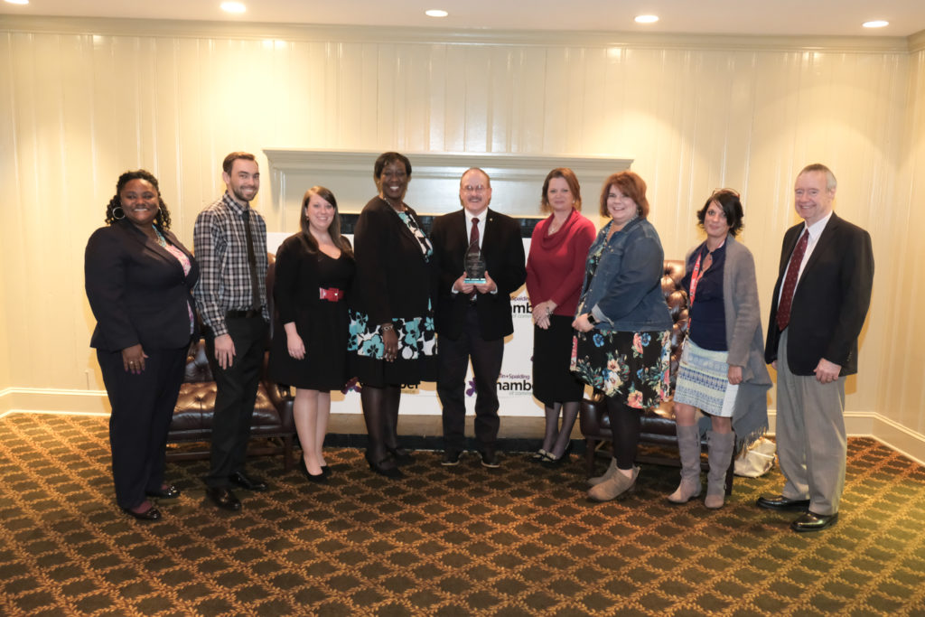 Pictured at the Chamber annual dinner are members of the UGA Griffin Campus team, from left, Lee Taylor, Ashley Biles, Ryan Hodgson, Thresa Parker, Lew Hunnicutt, Beth Horne, Melissa Gordon, Be-Atrice Cunningham, Chrystal McDowell, Kathleen Freeman, Kirk Kealey and Francisco Diez-Gonzalez.