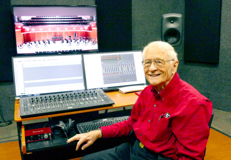 Image of Doug Moore sitting by audio equipment