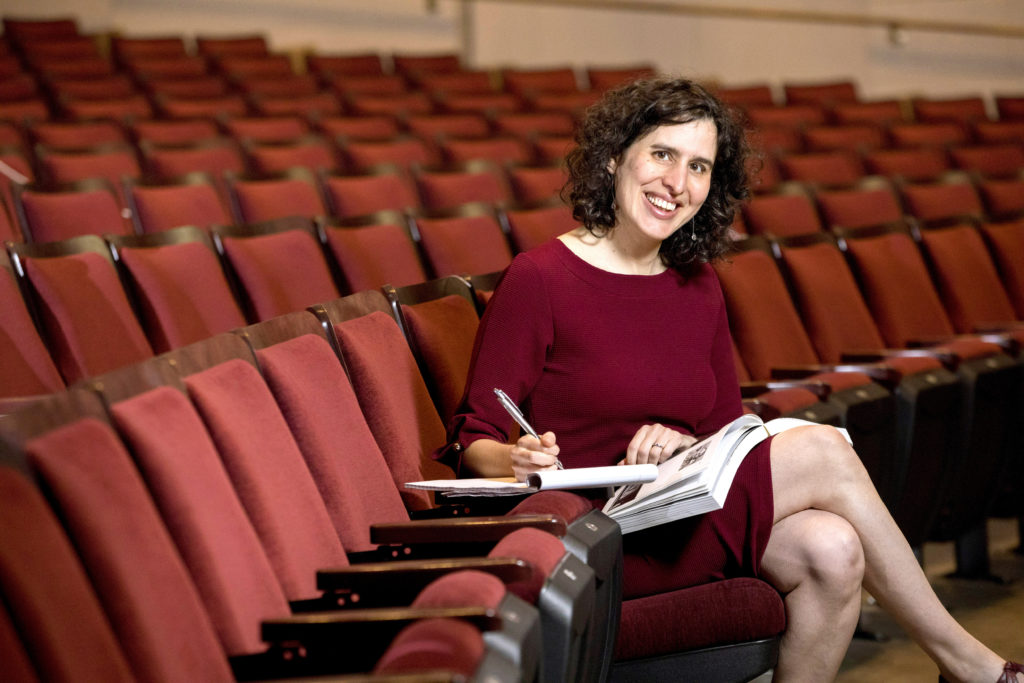 Photo of Emily Sahakian in the Fine Arts theatre.