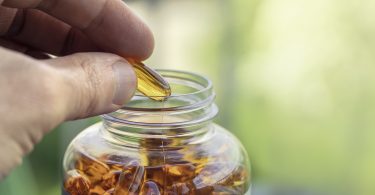 Jar with fish oil capsules.