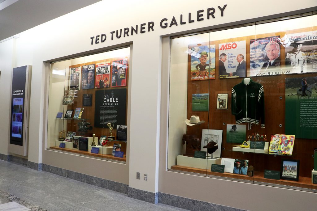 Image of two glass display cases with memorabilia
