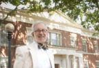 Portrait of Paul Kurtz in front of the law school