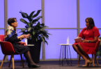 Mary Frances Early sits on a stage in a discussion with Joni Taylor.