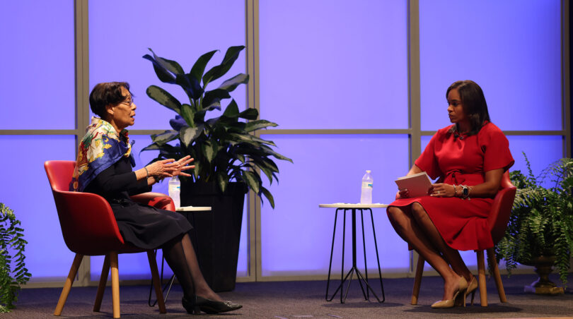 Mary Frances Early sits on a stage in a discussion with Joni Taylor.