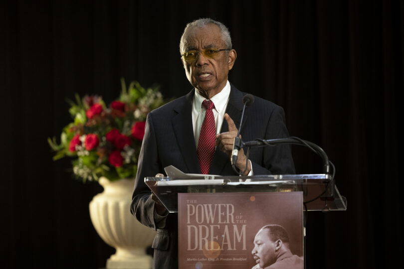 Art Dunning speaking at a podium for the UGA MLK Jr. Freedom Breakfast event