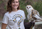Sarah Lynn Bowser is pictured holding an owl.