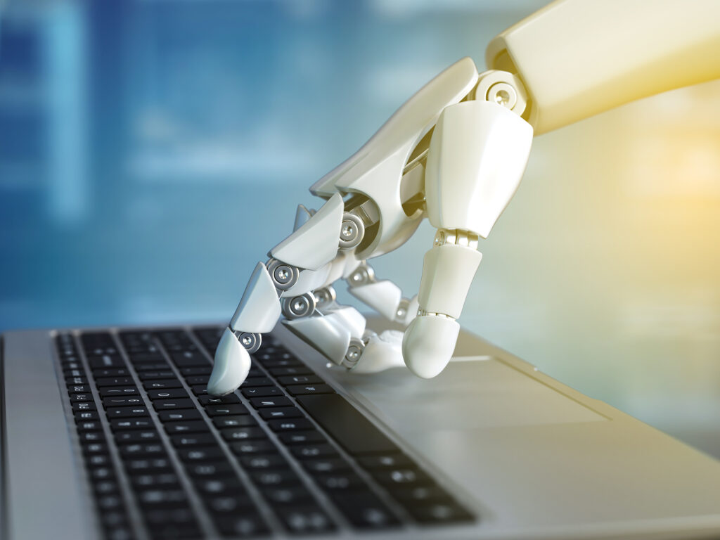 Robot hand typing on the laptop keyboard, 3d rendering isolated illustration