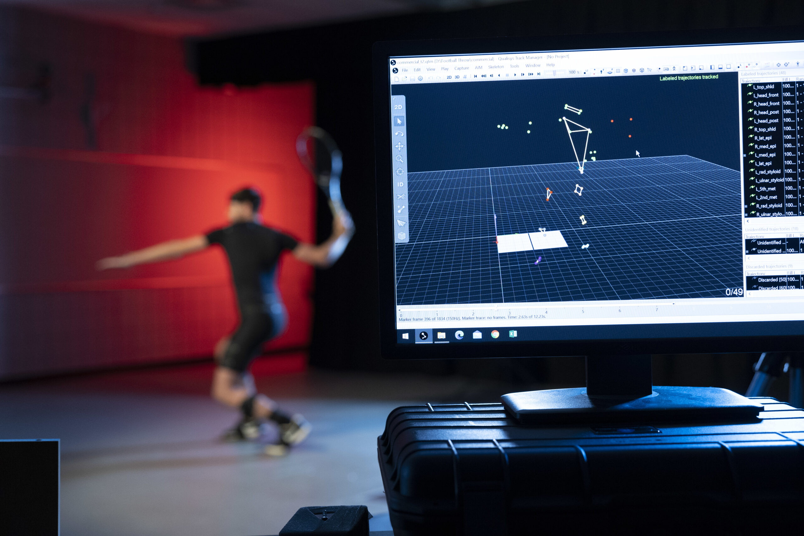 Conner Smith participates in a study in the bio-mechanics laboratory at the Ramsey Center. They are using motion capture to record his tennis swing.