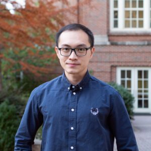 Environmental portrait of researcher in front of building