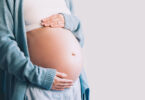 A pregnant woman is shown holding her belly. A new study suggests almost 6% of pregnant women use marijuana.