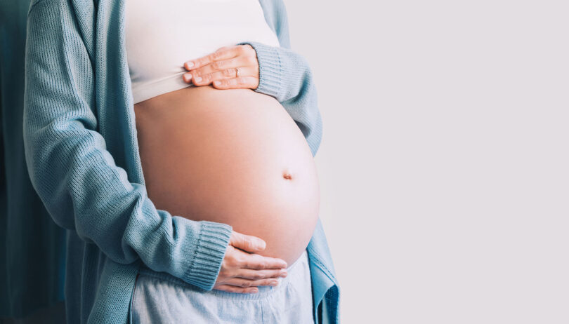 A pregnant woman is shown holding her belly. A new study suggests almost 6% of pregnant women use marijuana.