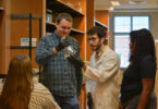 Fungus researcher Blake Billmyre works with members of his lab at the University of Georgia.