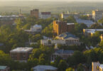 Overhead view of north campus with downtown Athens in the background.