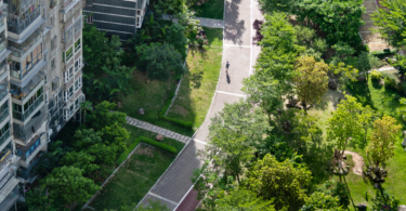 Aerial view of walkable green space next to a building (Getty Images)