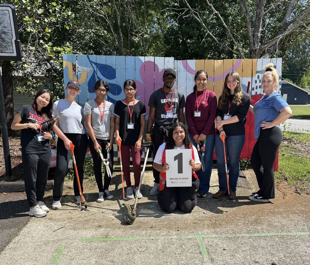 Talia Swanson and her service group at the Athens Area Homeless Shelter. (Submitted photo)