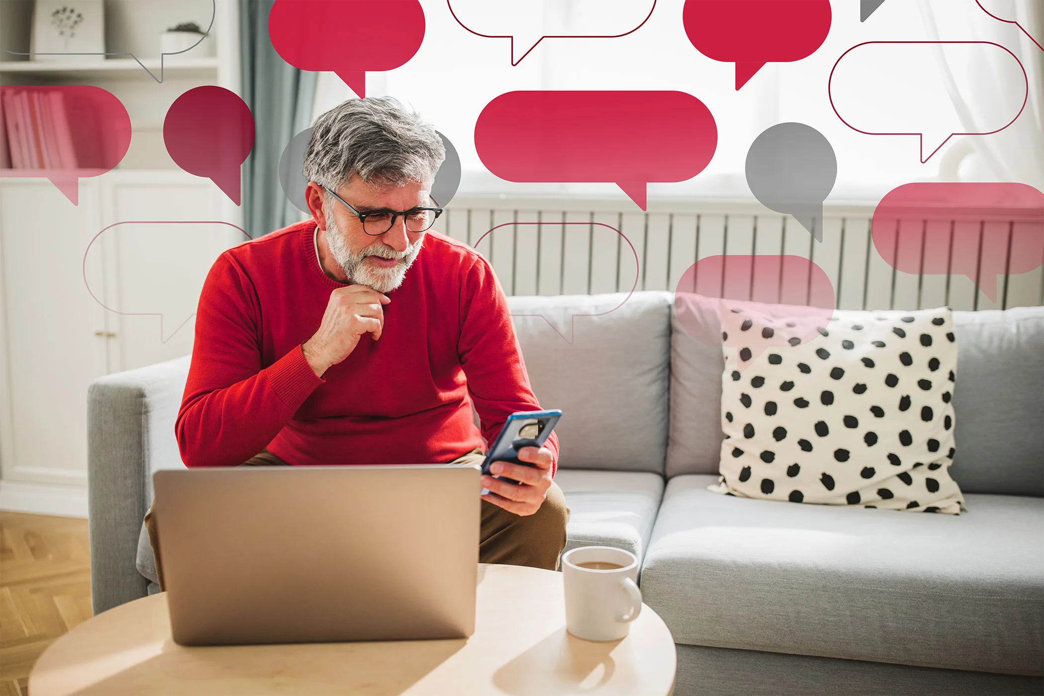 An illustrated photo shows a man sitting on a couch on his phone in front of his laptop with text bubbles appearing in the background.