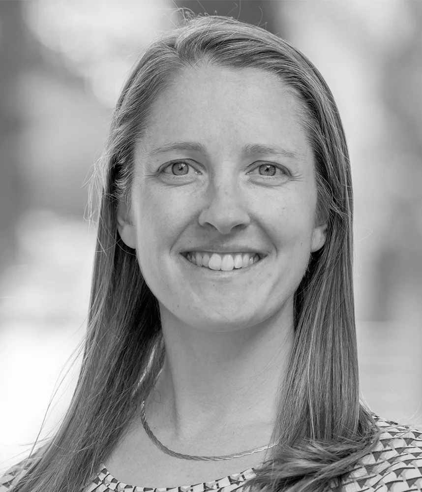 Black-and-white headshot of Julie Grainy