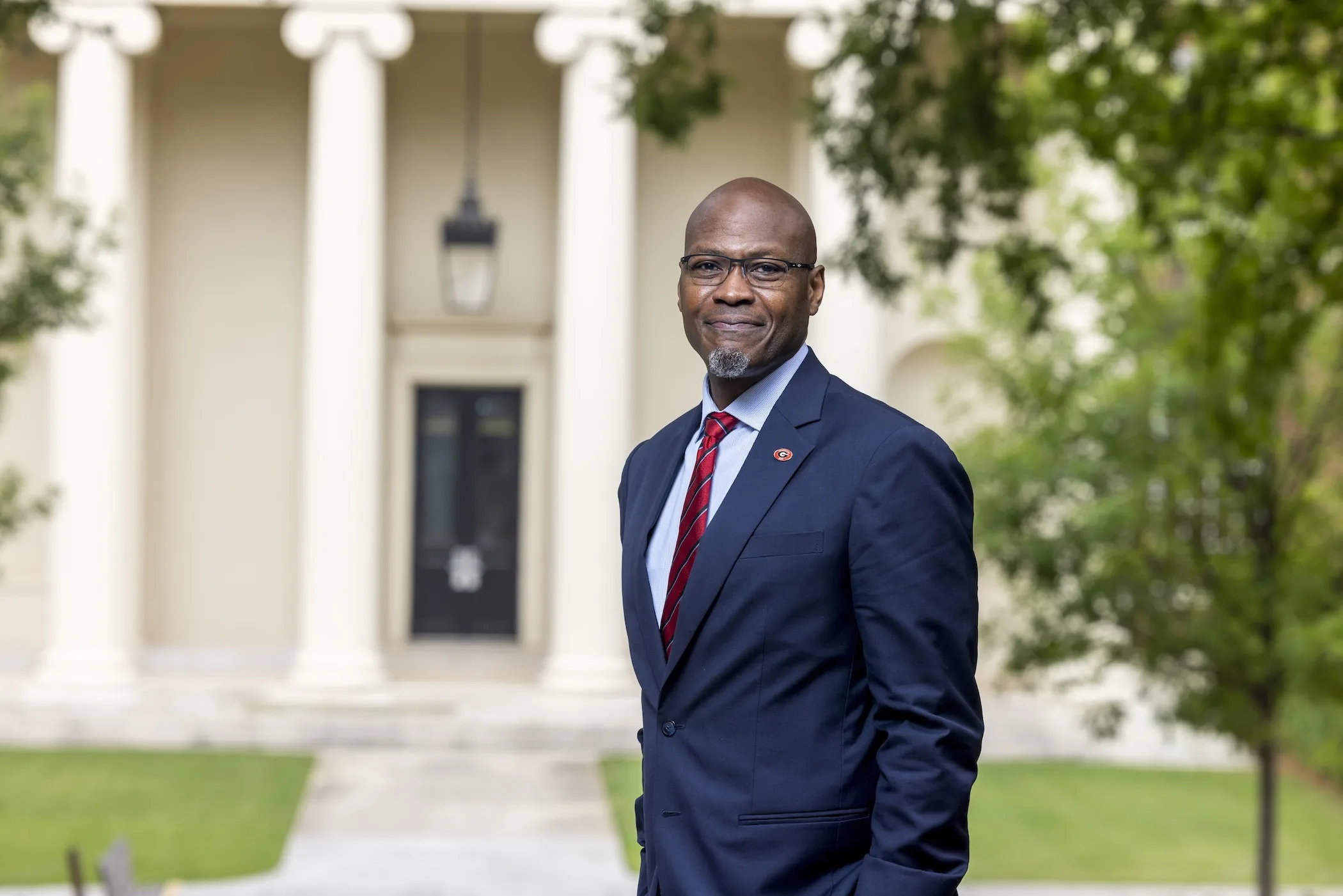 Environmental portrait of Ron Walcott, vice provost for graduate education and dean of the Graduate School, outside Brooks Hall.