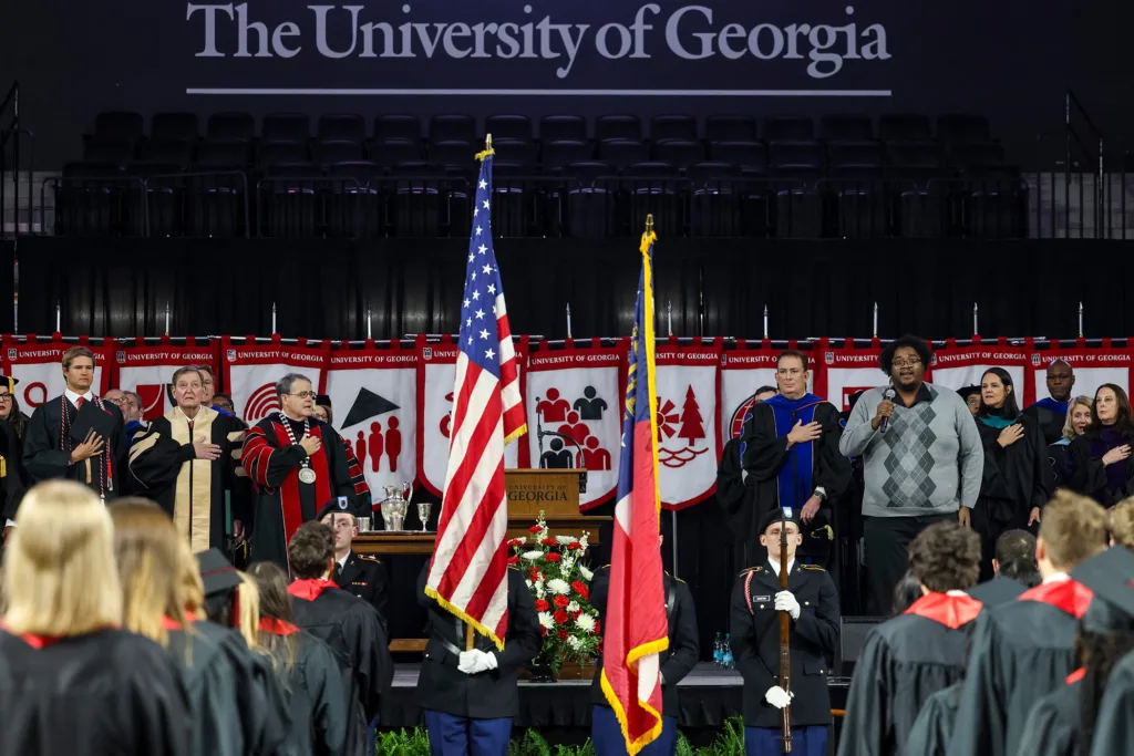 Trey Floyd sings the national anthem during fall undergraduate Commencement.