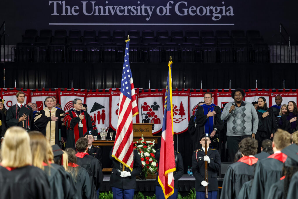 Trey Floyd sings the national anthem during fall undergraduate Commencement.