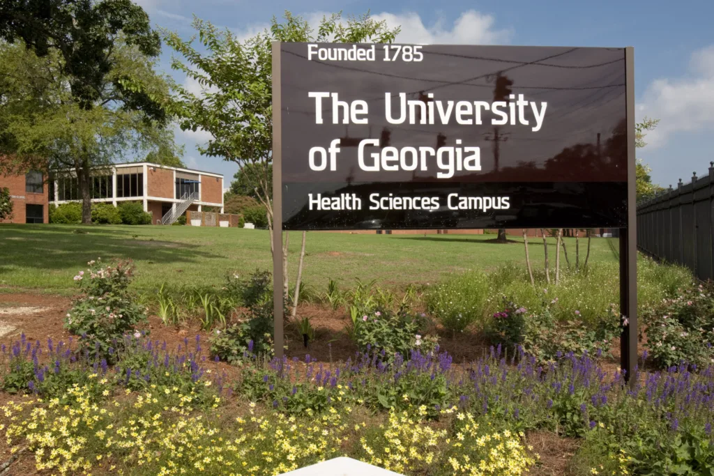 A large, outdoor sign that reads "founded 1785 the university of georgia health sciences campus".